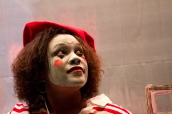 The Mute (Lydia West) listens in carefully.