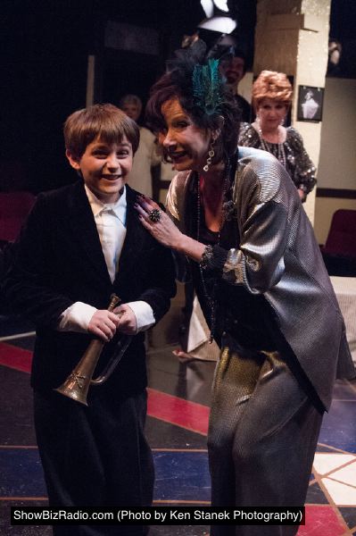 Mame (Michele Densmore) introduces Patrick (Austin Brannan) to a new world and promises to open a new window.