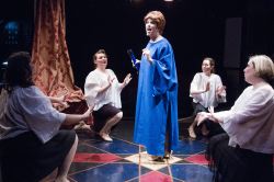 Vera Charles (Eleni Densmore) performs as a lady astronomer in Man in the Moon.